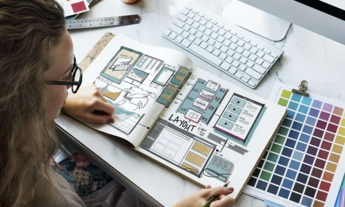 woman fixing the design layout