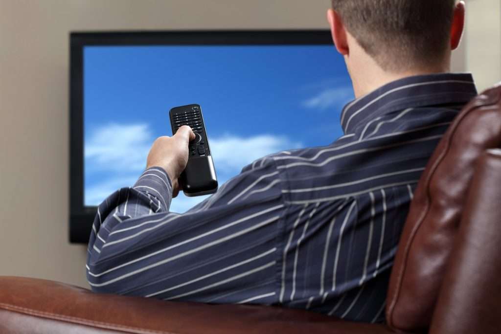 watching television