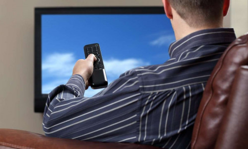 watching television